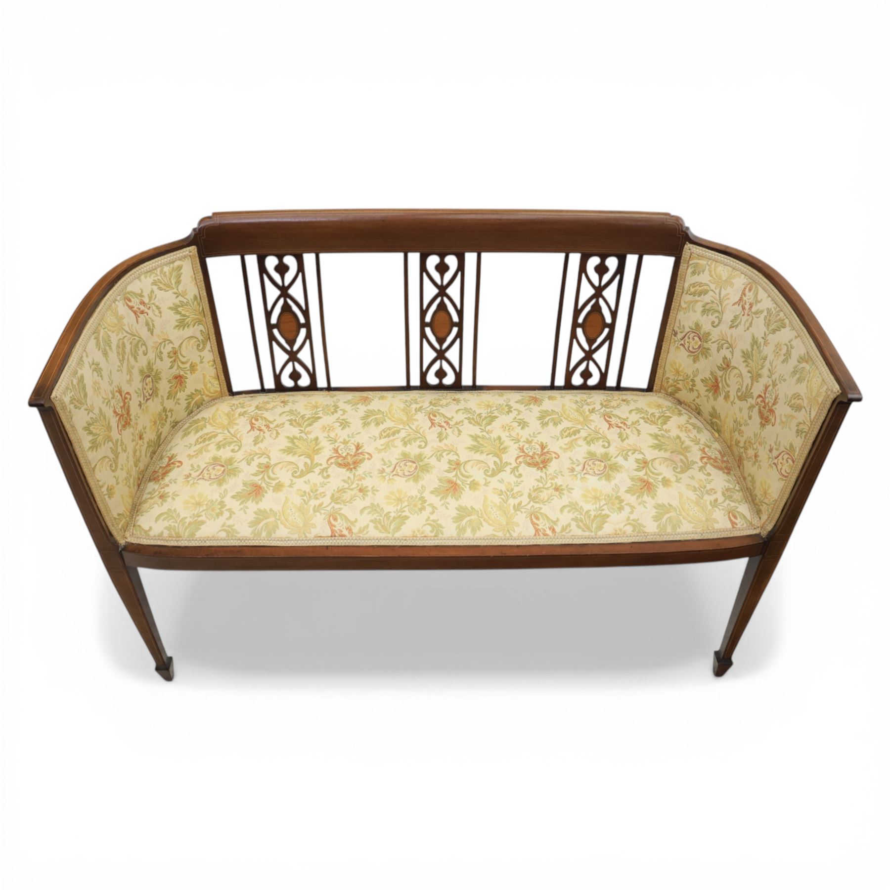 Edwardian mahogany boudoir suite couch, the couch back with three openwork splats inset with oval satinwood panels, the inlaid top rail extending to upholstered outswept ends, raised upon square tapering legs terminating in spade feet