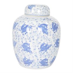 Blue and white ginger jar, decorated in a repetitive pattern of fish swimming amongst dens...