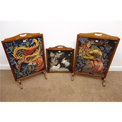  Pair of mahogany framed firescreens, woolwork decorated with exotic birds, (H94cm, W62cm) another with silkwork fighting cocks and two crewelwork cushions (5)   