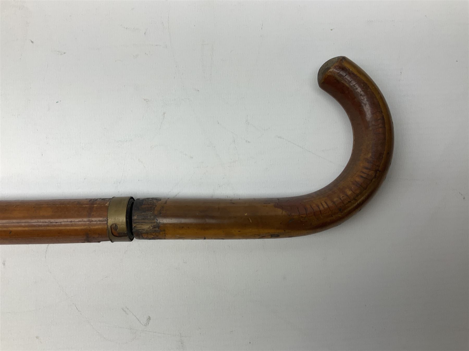 Late 19th/early 20th century sword stick/walking cane with 38cm fullered steel blade 85cm overall