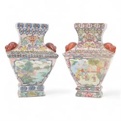 Near pair of famille rose vases, of matching shape, one with central panels depicting chil...