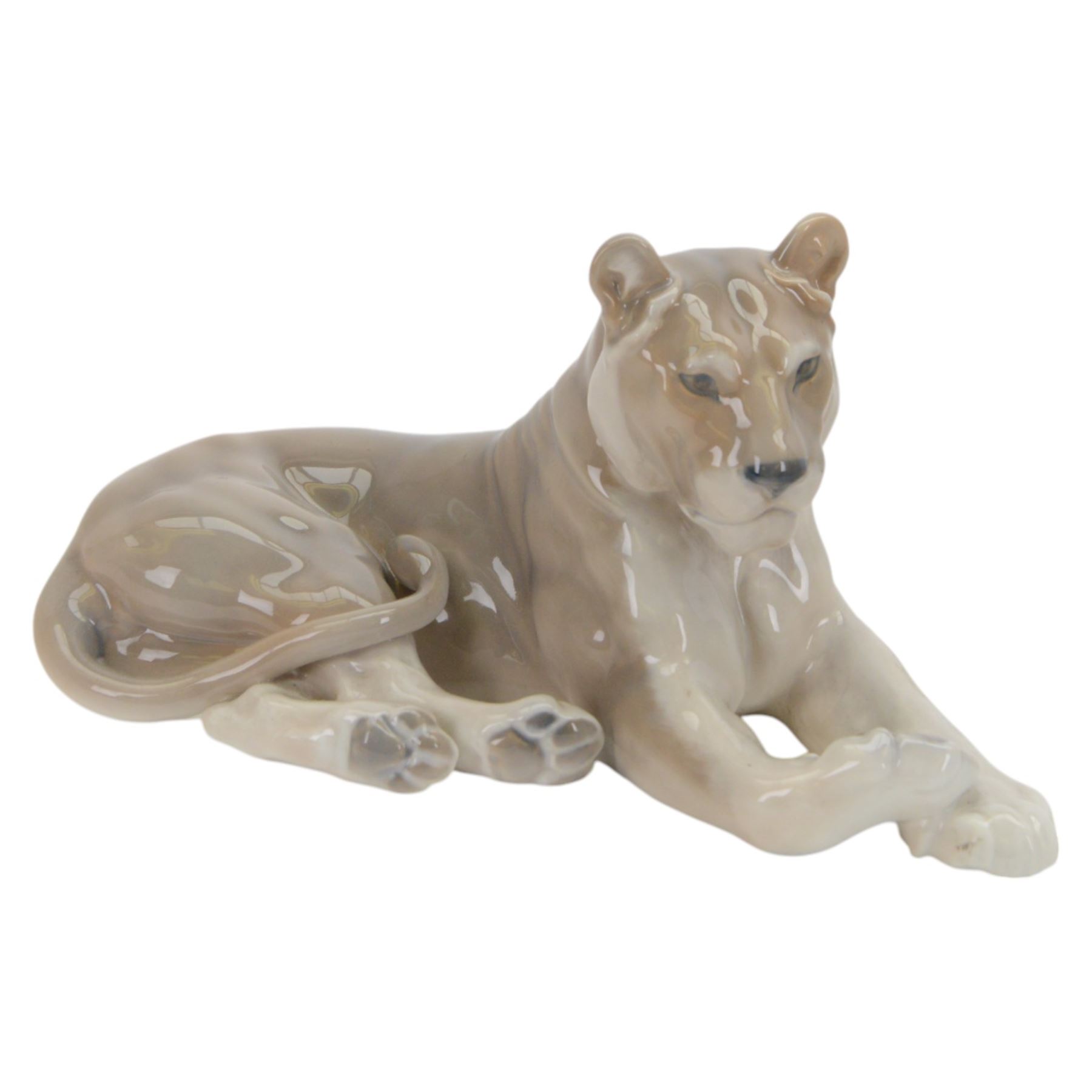 Royal Copenhagen recumbent lioness, no.804, with printed marks beneath H16cm