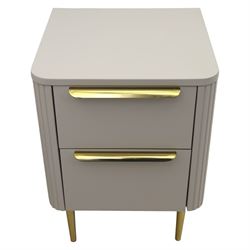 Made.com - 'Ebro' pair of grey bedside chests, gold painted metal shaped handles, rounded corners with fluted detail, raised on gold painted metal tapered supports