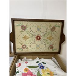 1950s Coronation themed sampler, embroidered wooden tray and a collection of other linens and textiles, in two boxes