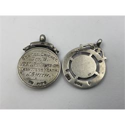 Seven early 20th century silver fobs, all embossed with sporting scenes, to include a gold faced example depicting a cricketing scene, hallmarked Chester 1932 and one depicting a tennis scene, all hallmarked with various dates and makers
