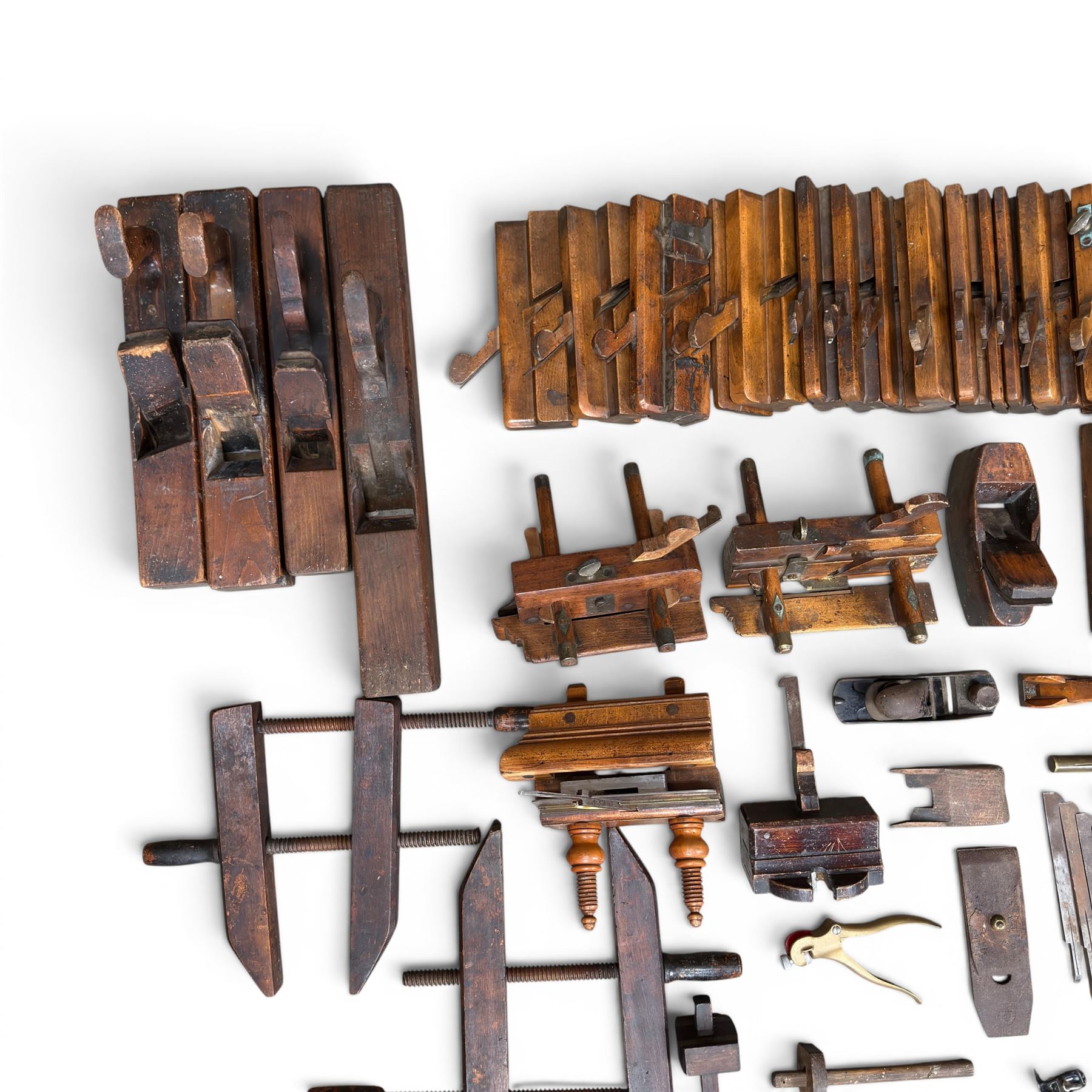 Collection of planes and woodworking tools including wood planes, chisels, hammers etc along with three books (Antique Woodworking Tools, Timber Preservation and Woodworkers Pocket Book)