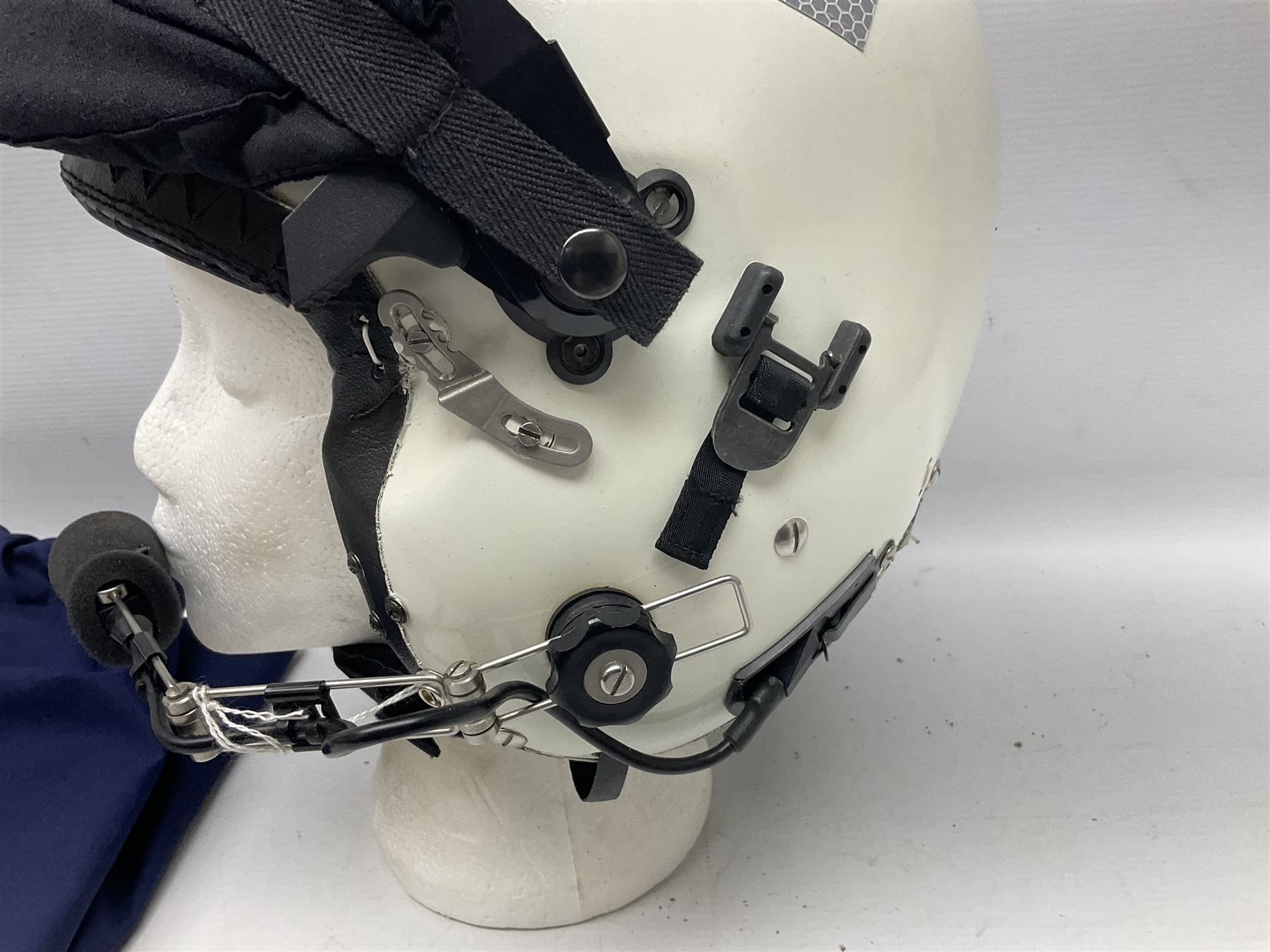 RAF Alpha MK 4 helicopter pilot's flying helmet, finished in white for civilian/rescue service use; reconditioned and avionics tested as working; black cloth cover to visor; fitted with boom microphone; medium size; in blue cloth carrying bag