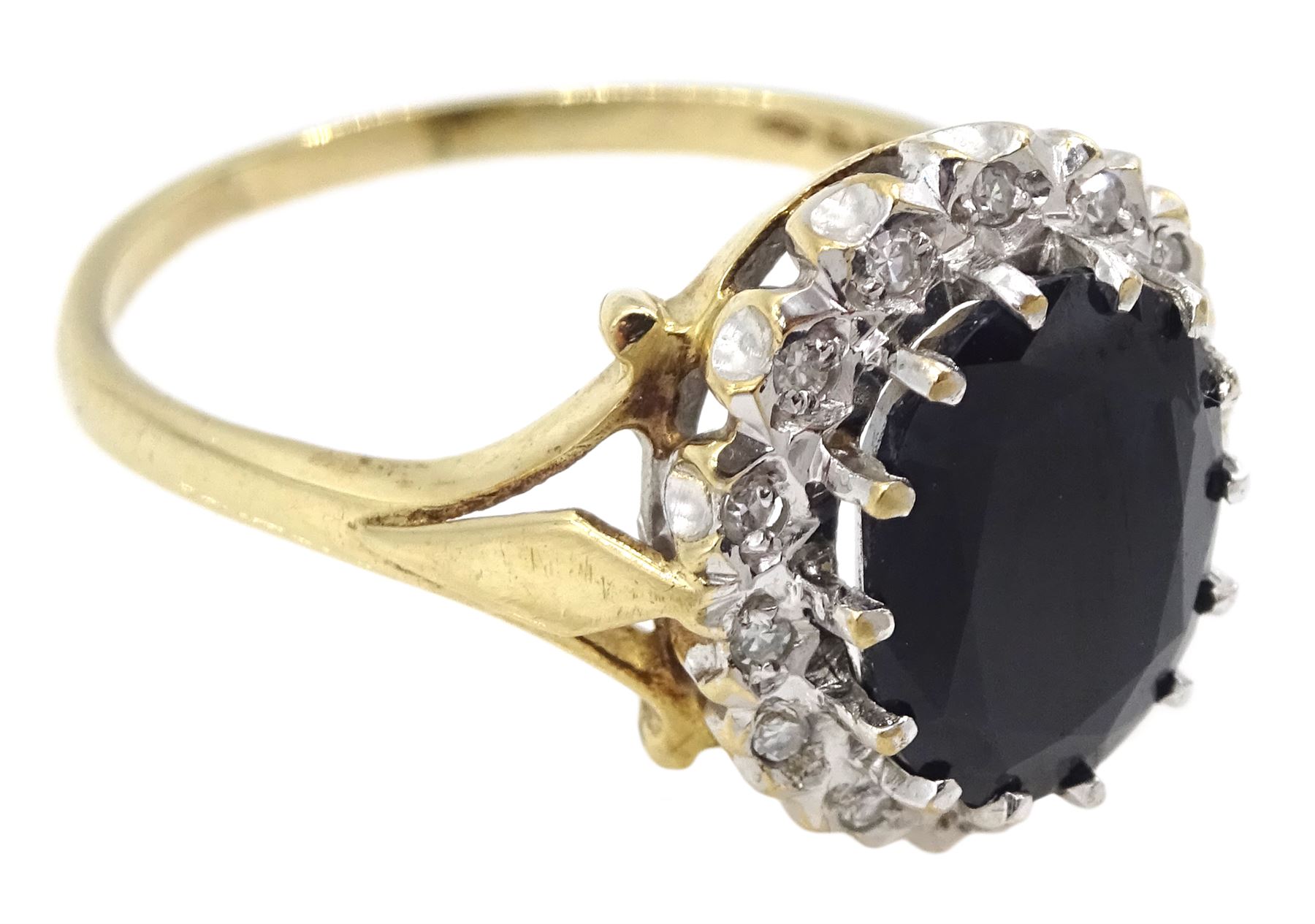9ct gold oval cut sapphire and diamond cluster ring, hallmarked