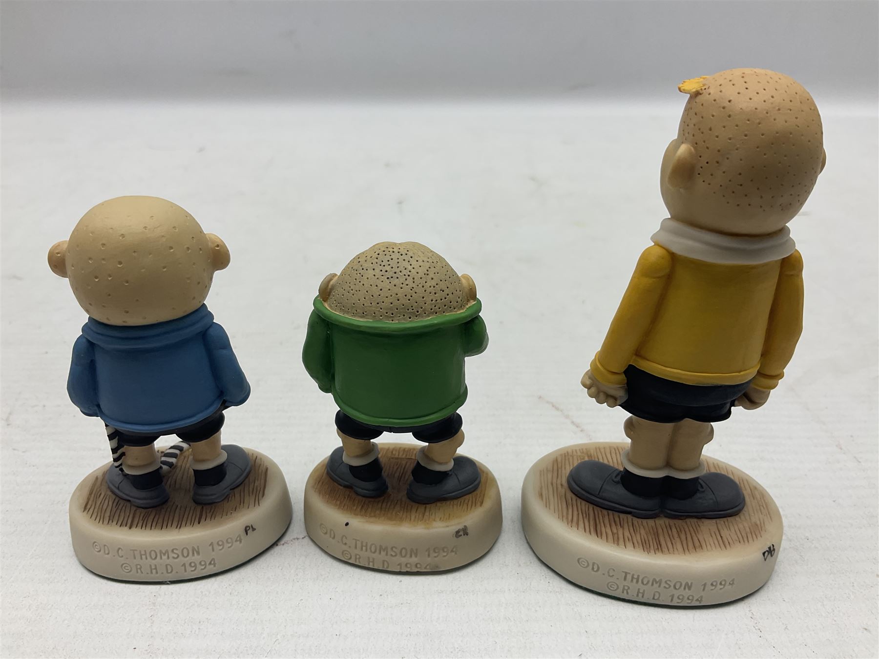 Fourteen Robert Harrop figures from the Beano Dandy collection, comprising Minnie the Minx BD04, Danny BD10, Biffo the Bear BD19, Spotty BD16, Smiffy BD09, Oops! BDS01, Little Plum BD27, Wilfrid BD15, Danny BD10, Winston BD17, 'Erbert BD14, Gnasher BD02, Beryl the Peril BD05 and Desperate Dan BD03, all with boxes