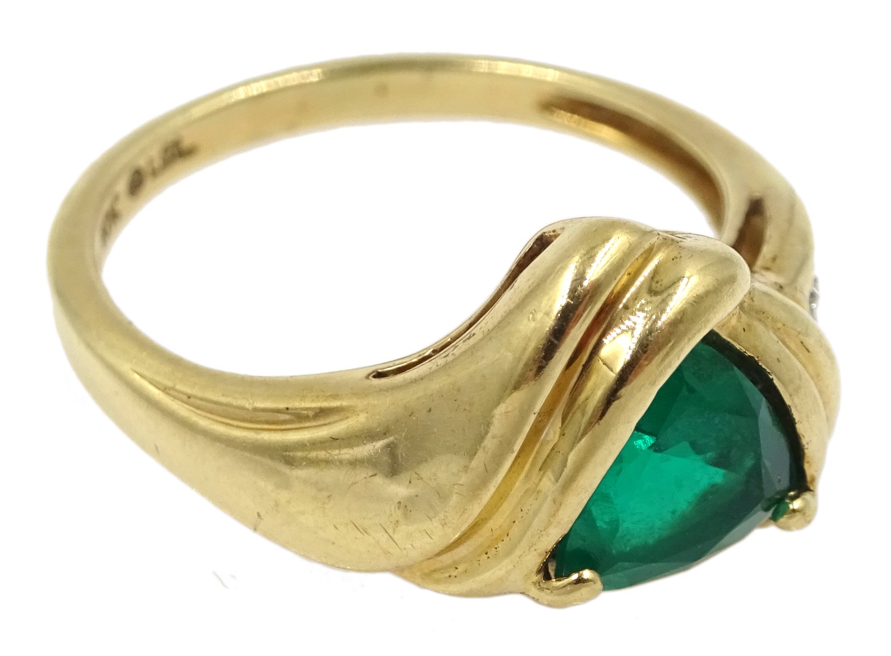 Gold green stone set ring, with diamond set shoulder, stamped 10K