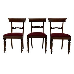 Seven early 19th century mahogany dining chairs - set six side chairs with scroll carved middle rails (W46cm), and a carver elbow chair with rope twist middle rail