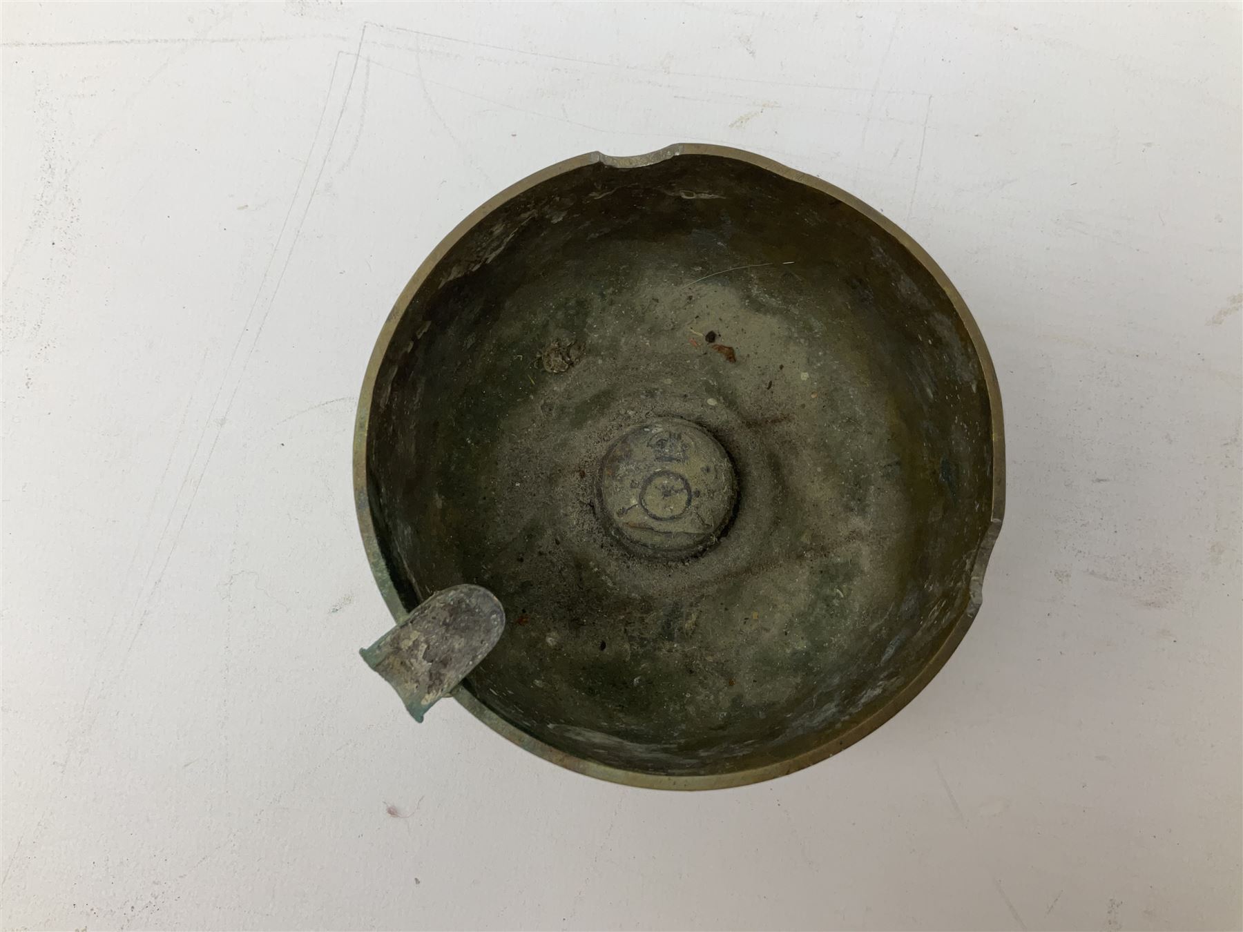 Trench Art - three WW2 brass shell case ashtrays, one mounted with Royal Artillery cap badge and button and one mounted with RA button; together with a pair of place name holders each formed from a Royal Artillery cap badge (5)