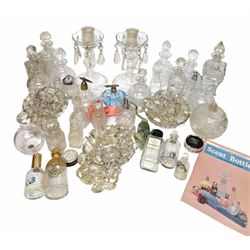 Pair of glass lustre candlesticks, together with a collection of lustre droplets and Victorian and later cut glass scent bottles