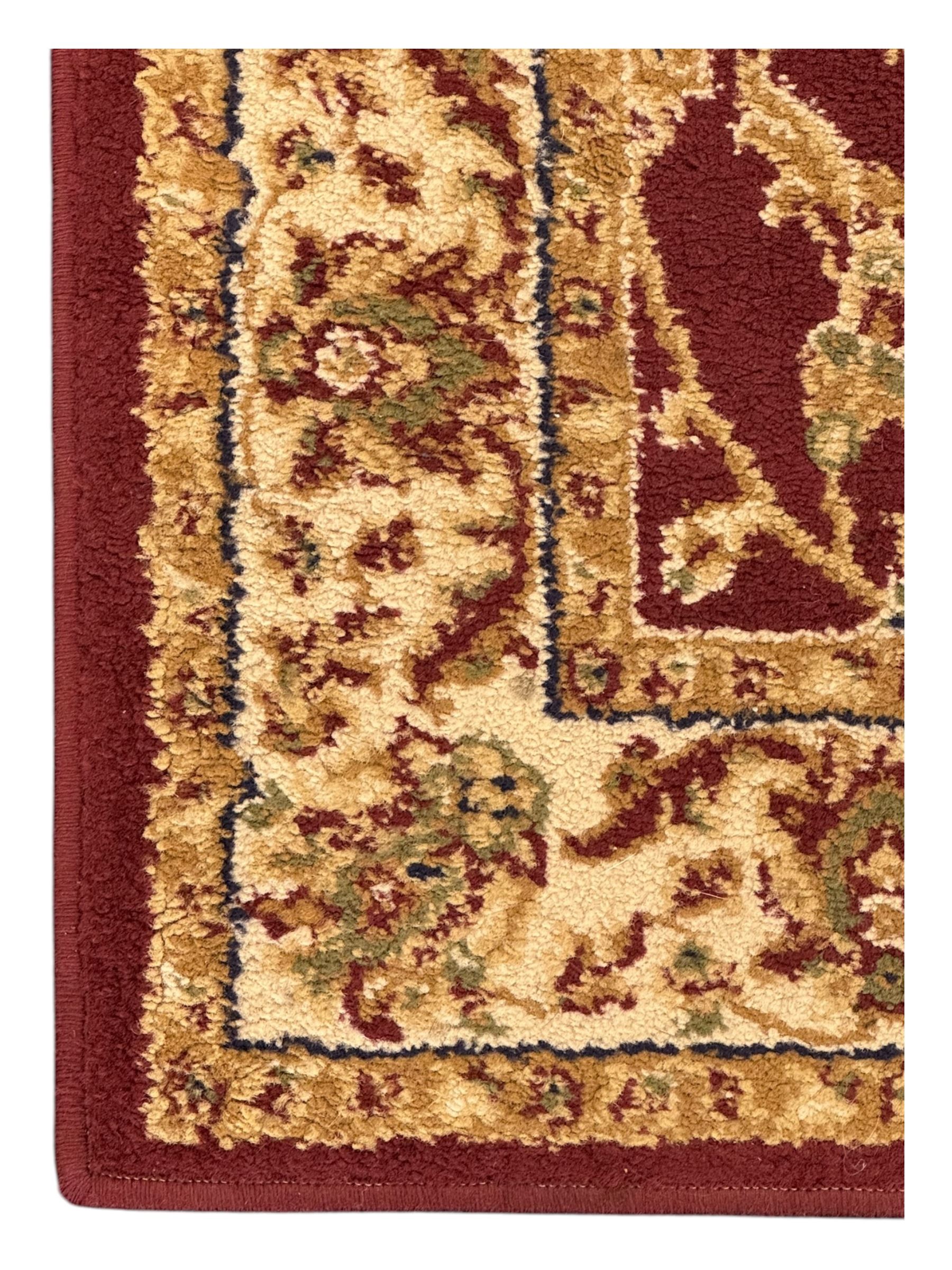 Contemporary Dunelm 'Legacy' ground rug, the field decorated with symmetrical scrolling foliate and floral motifs, bordered by an ivory band with repeating floral designs interspersed with leafy branches, inner guard stripe with fine linear patterning