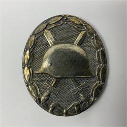 Four German awards c1957 - Knights Cross of the War Merit Cross, War Merit Cross 1st Class, Faithful Service Cross and Silver Wound badge (4)