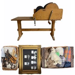 Louet hand wool carding machine together with various sheep shears, wool samples in framed display, bags of scoured and carded wool, wool scarves and other related items 
