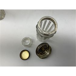 Edwardian silver mounted purse, with circular panel engraved with initials, and hammered finish, hallmarked William Comyns & Sons, London 1903, H14cm, together with three dressing table glass jars with hallmarked silver covers, and a hallmarked silver mounted buffer 