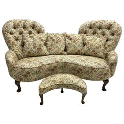 Victorian design hardwood-framed double back settee, upholstered in buttoned floral pattern fabric, curved back over serpentine seat, on cabriole feet, with matching scatter cushions (W182cm, H94cm, D86cm); together with crescent-shaped footstool with cabriole feet (W55cm)