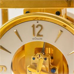 Jaeger-Le-Coultre, Atmos bracket clock, gilt brass case with glazed top and sides, silvered chapter ring with the numerals interspaced with batons, serial number 35125, H24cm