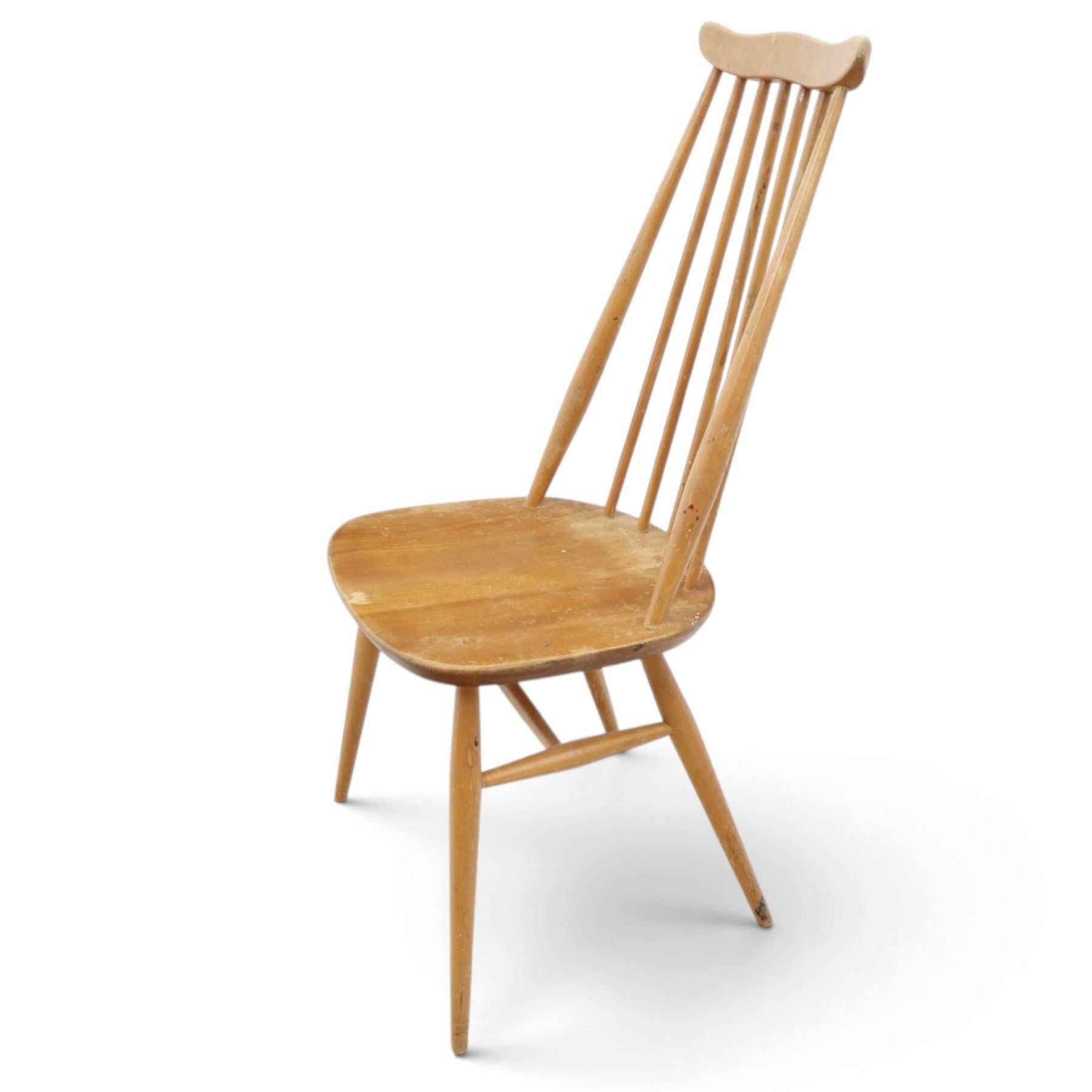 Ercol - 'Goldsmith' light elm set of four dining chairs, shaped cresting rail above seven spindles, dished seat raised on tapering supports with H-stretcher