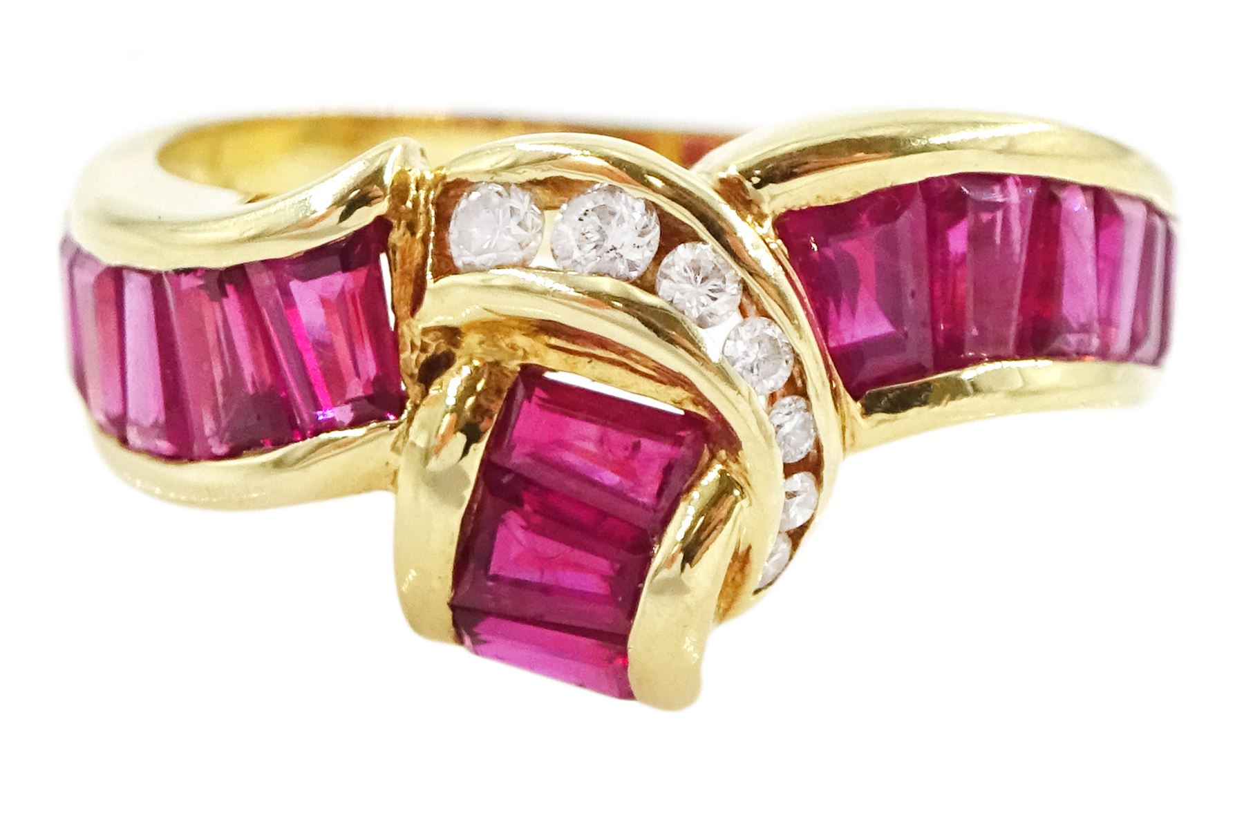 18ct gold ruby and diamond crossover ring, channel set with fifteen calibre cut rubies and seven graduated brilliant cut diamonds