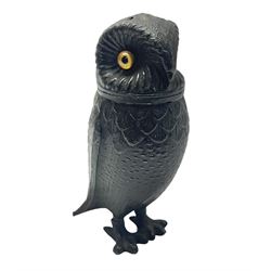 Novelty pewter pepper shaker in the form of an owl with screw off head and glass eyes