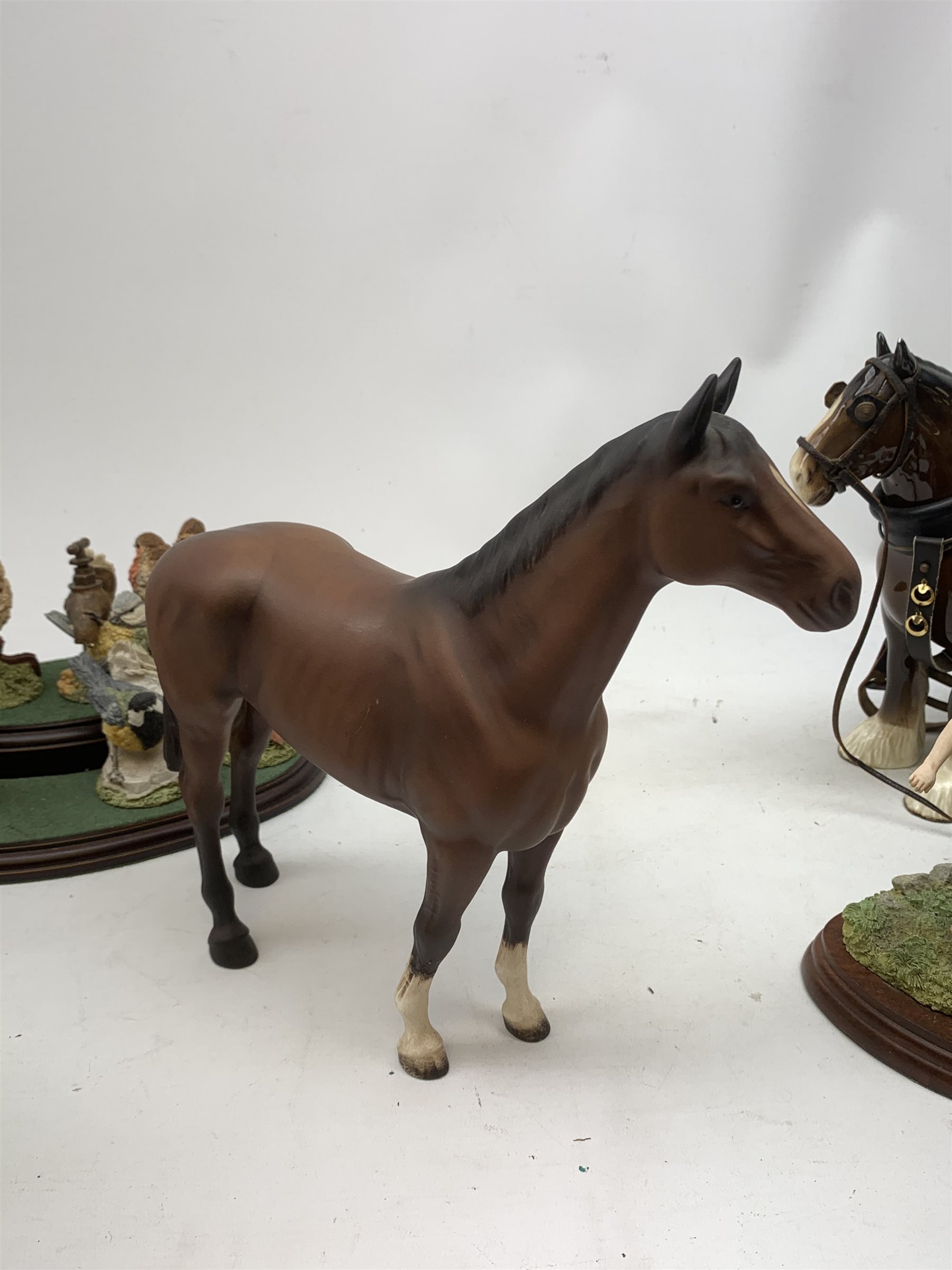 Three Beswick horses comprising: 'The Winner' no. 2421,  Shire Horse and Dale Pony (a/f), Border Fine Arts group 'Feeding Piglets' A5030, Beswick Beatrix Potter figure,  set of six Royal Doulton birds on stand etc 