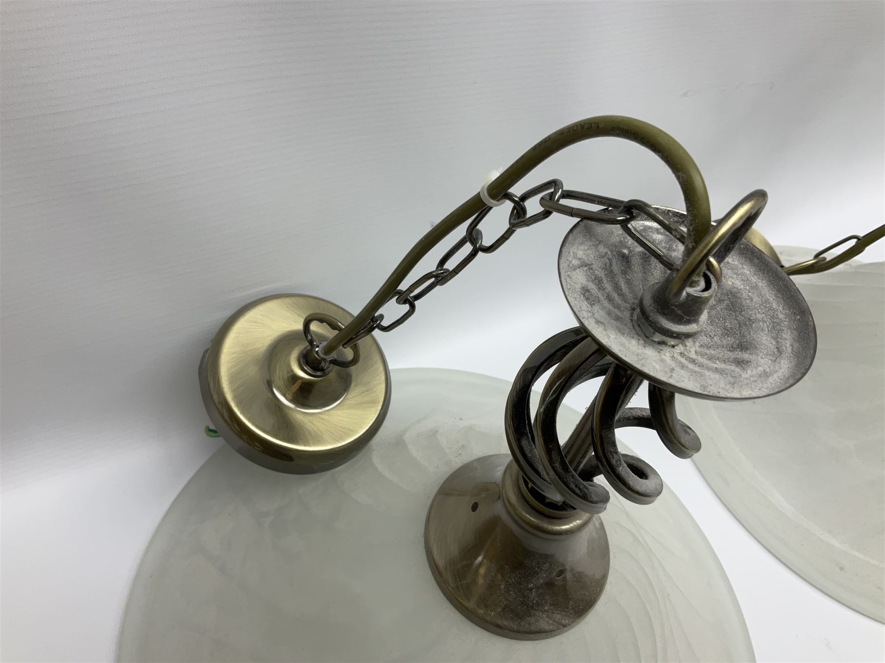 Three frosted glass light fittings with brushed metal mounts, approx L30cm excl fitting