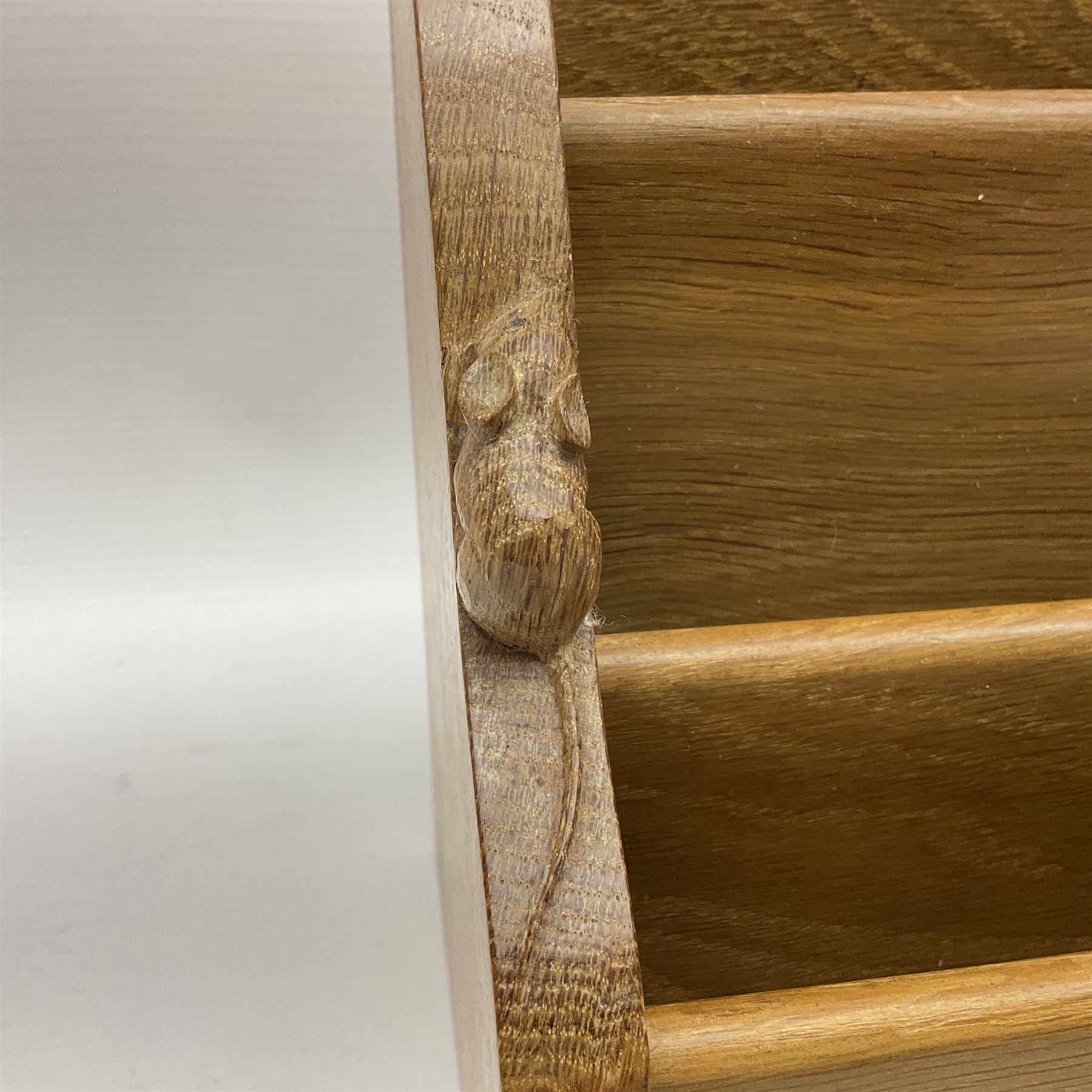 Mouseman - oak letter rack, shaped end supports enclosing three divisions, carved with mouse signature, by the workshop of Robert Thompson, Kilburn