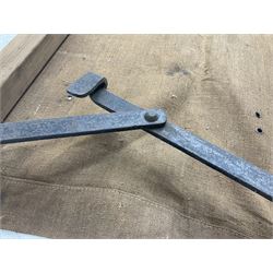 WW1 British casualty stretcher with iron mounted pitch pine sides and canvas base; stamped 'HL1917' and L7 with broad arrow in a triangle L236cm ( reputedly recovered from a barn at Bapaume on The Somme)