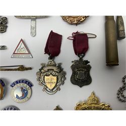 Two Edwardian hallmarked silver presentation fobs for military bugling competitions; and quantity of cap/glengarry and other badges, sweetheart brooches etc