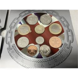 The Royal Mint United Kingdom 2006 brilliant uncirculated coin collection, in card folder and a part set of The London Mint Office 'The Platinum Wedding Anniversary Photographic Collection' coins