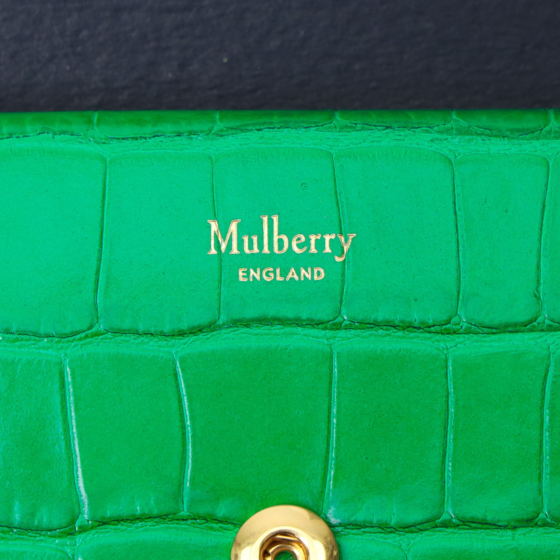 Mulberry - ‘Harlow Medium’ wallet in Emerald Green crocodile-embossed leather, the double envelope flap with gold-tone twist-ring Rider’s Lock fastening, opening to a gusseted interior with four card slots, zipped coin compartment and front press-stud pocket, with box