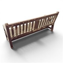 Teak garden bench with slatted back and seat raised on square supports