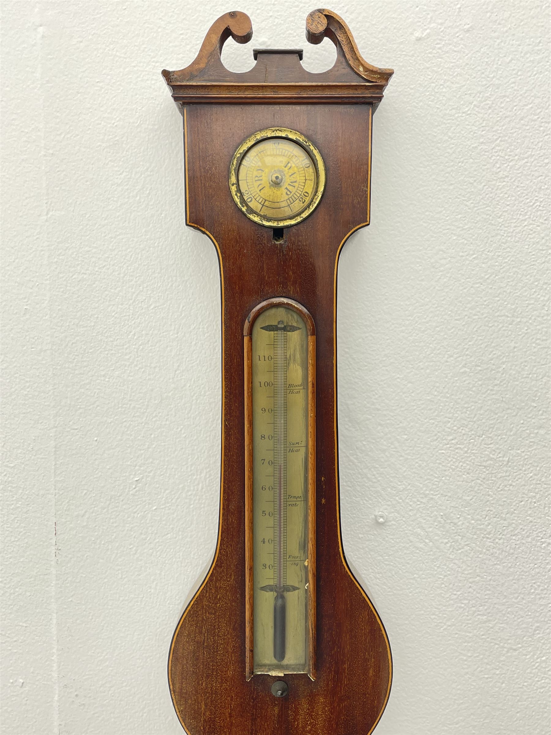 Early 19th century mahogany banjo barometer, scroll pediment over dry/damp and thermometer dials with brass registers, by ‘Crowden & Garrod, London’ (H107cm), and an early 20th century walnut and satinwood banded barometer by ‘Aitchison, London’ (H96cm)