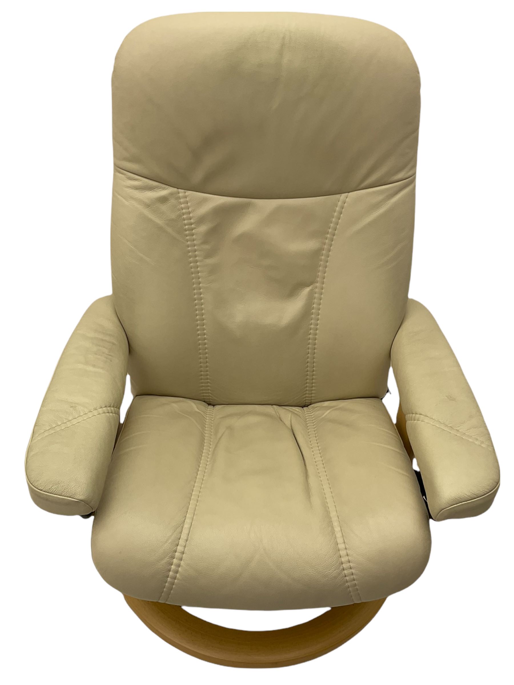 Ekornes - Stressless armchair upholstered in cream leather with matching footstool 