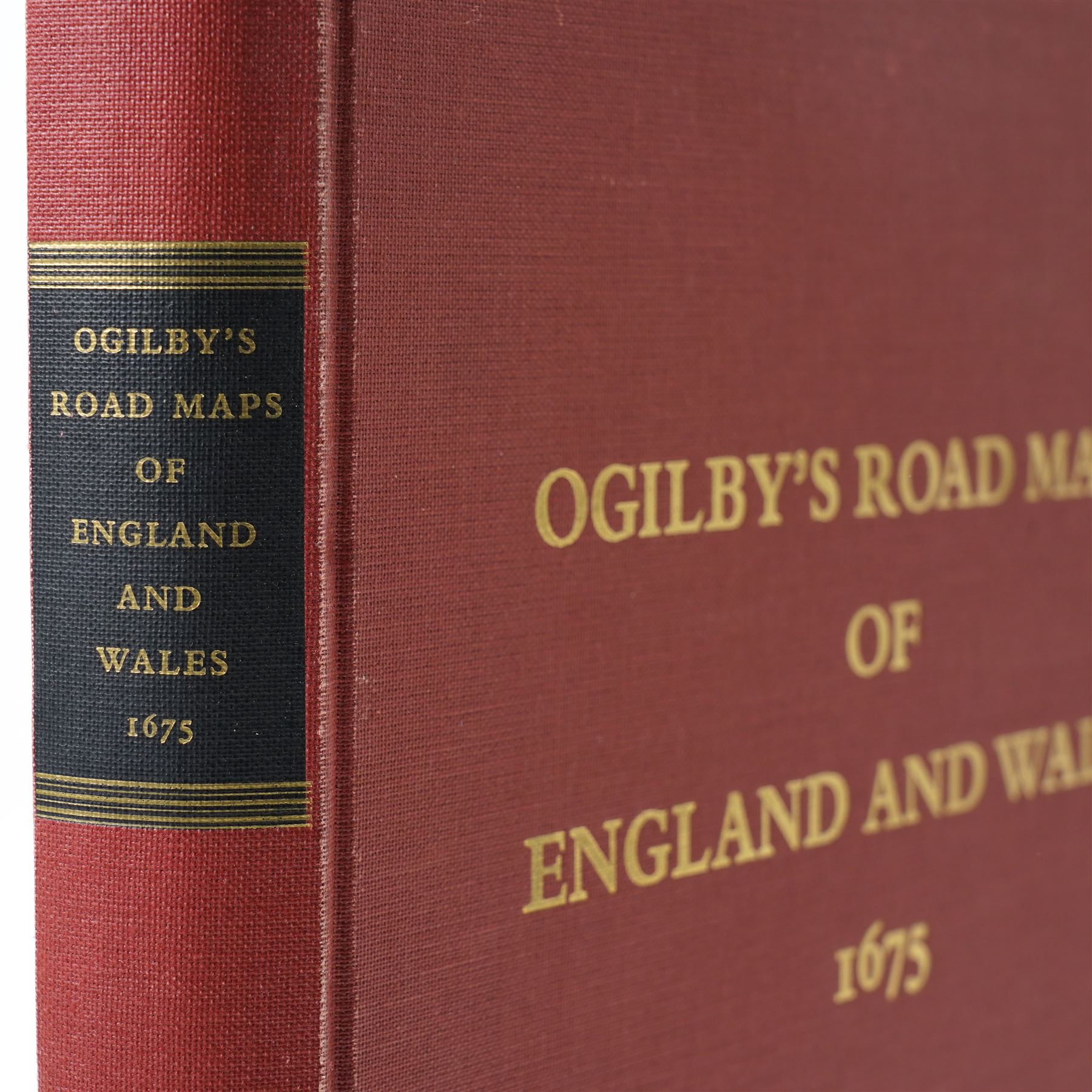 John Ogilby (British 1600-1676): 'Ogilby’s Road Maps of England and Wales 1675', modern facsimile edition of Britannia pub. by Osprey Publications Ltd., Reading, 1971, printed in the Netherlands by Miedema & Co., large folio red cloth gilt containing full reproductions of Ogilby’s strip road maps and title pages