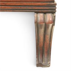  Pair of Regency mahogany bedside cabinets, rectangular top above a central cupboard door with flame mahogany veneer, flanked by spirally turned column uprights, raised on shaped supports