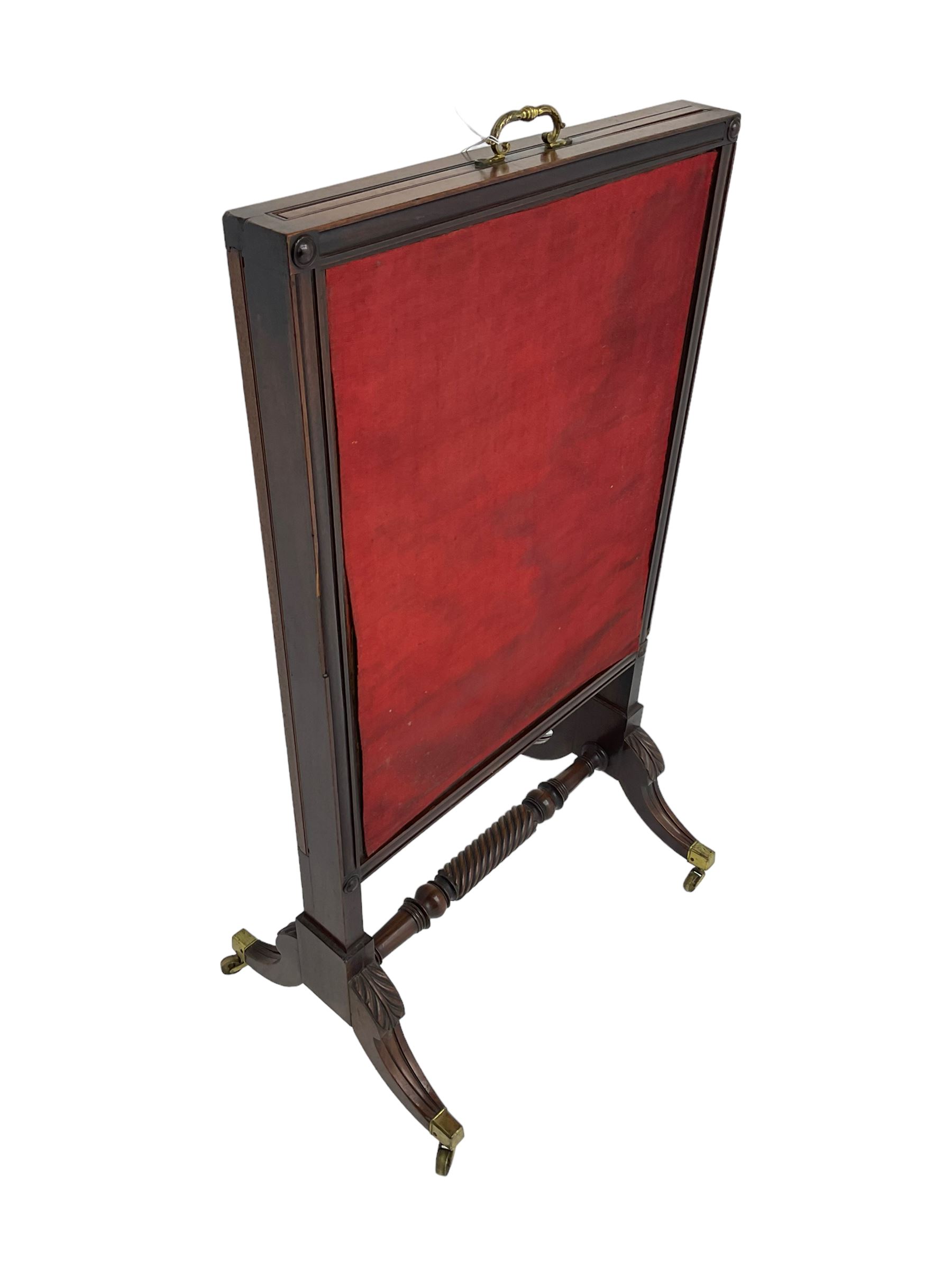 Regency mahogany screen with two horizontal and one vertical pull-out panels, on base with carved sabre legs and rope-twist stretcher