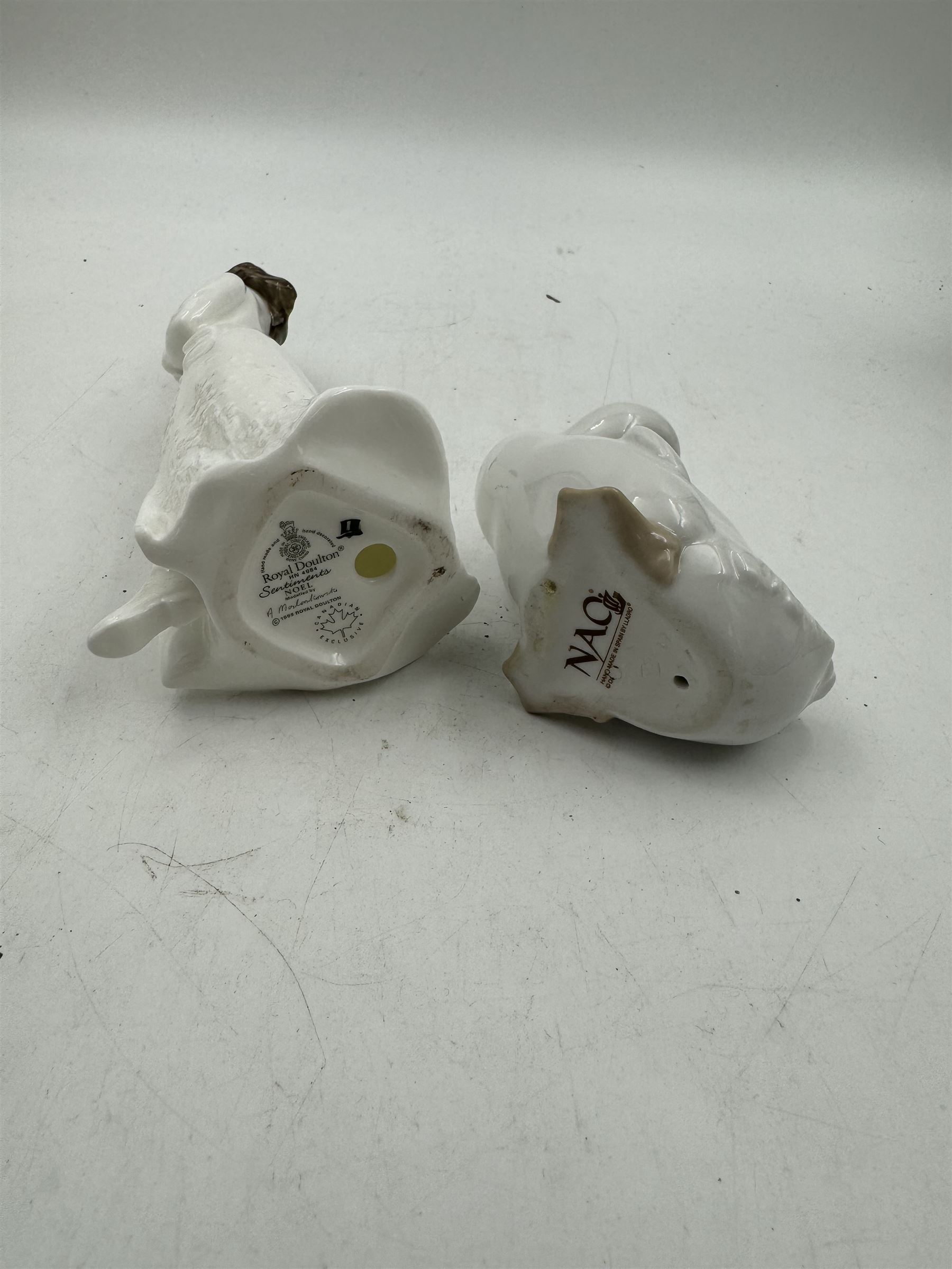 Lladro figurine, Basket of Love 7622, together with Royal Doulton figure Noel HN4084, Royal Worcester figure Sweet Dreams and three others 