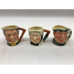 John Beswick figure of a seated piglet, Beswick Beatrix Potter Mrs Rabbit and Peter figure, and quantity of Sandland Character Ware jugs