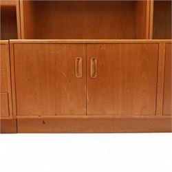 G Plan - Mid 20th century teak sectional wall cabinet, comprising six modular units including a fall front bureau, glazed display cabinet, open bookcase, cupboard and drawer bases, each with recessed handles and flush plinths