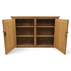 Victorian waxed pine low cupboard, fitted with two panelled doors and panelled sides, two interior shelves