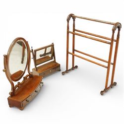Two late 19th century mahogany toilet mirrors and a towel rail, one oval adjustable mirror...
