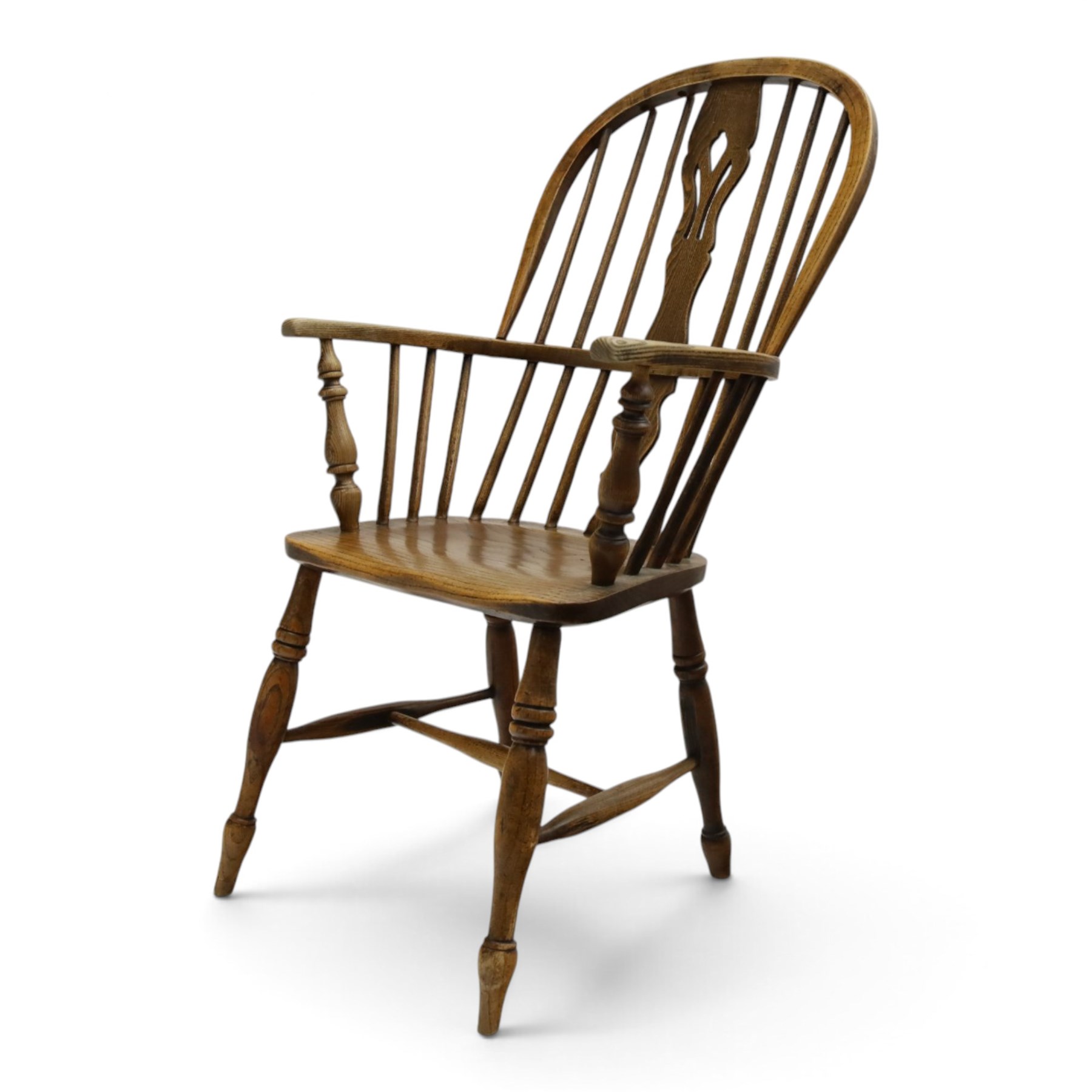 Early 20th century elm and ash high-back Windsor chair, double hoop-and-stick back with pierced and shaped splat, on turned supports joined by H-stretcher