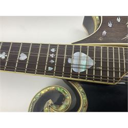 Eastern F-hole eight-string mandolin with black finish and mother-of-pearl inlay of a man riding a winged horse/unicorn amongst clouds and stars with playing card suits to the fingerboard L71cm