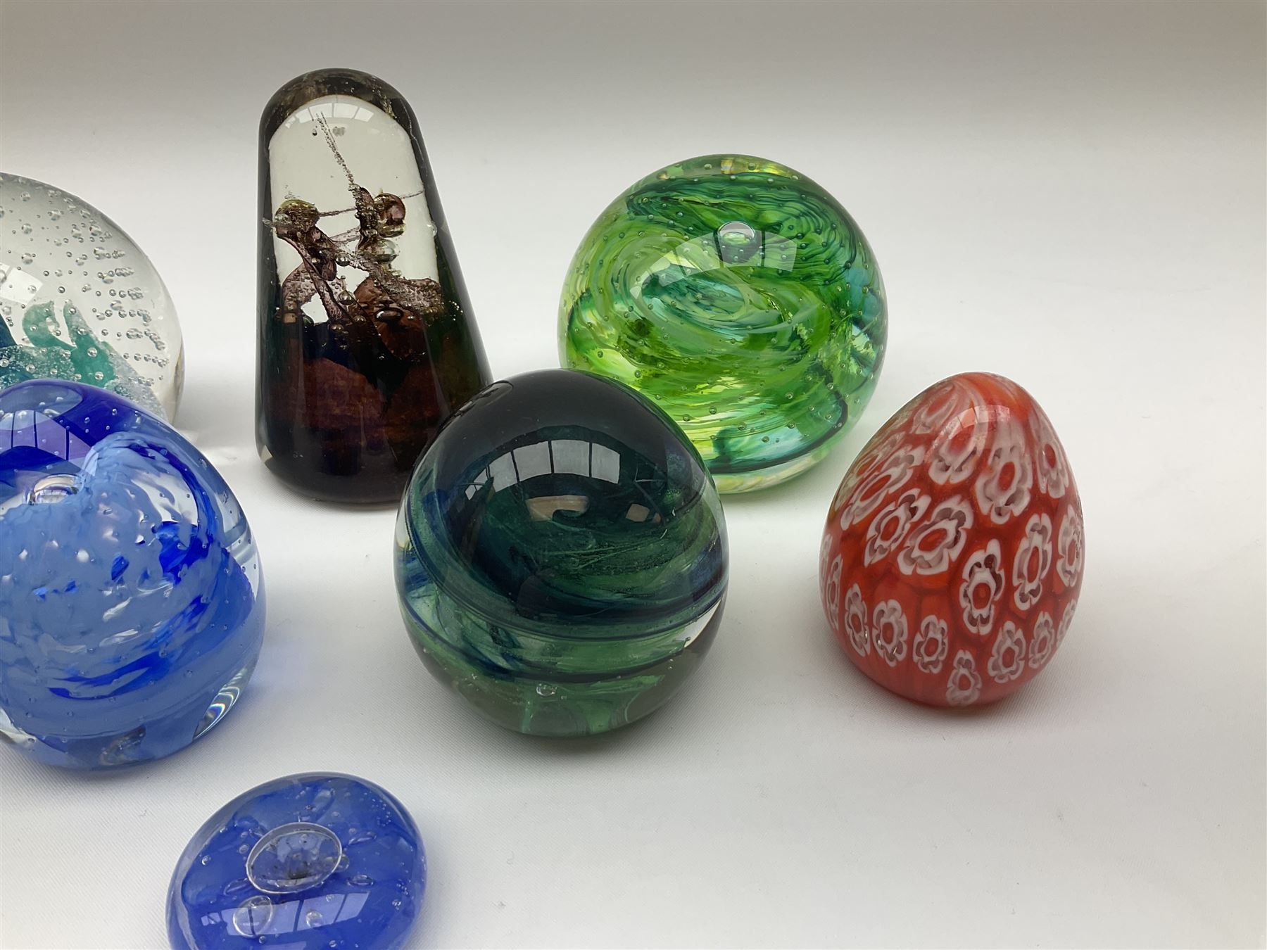 Caithness paperweights comprising 'Journey', 'Twirl', 'Blessings' and