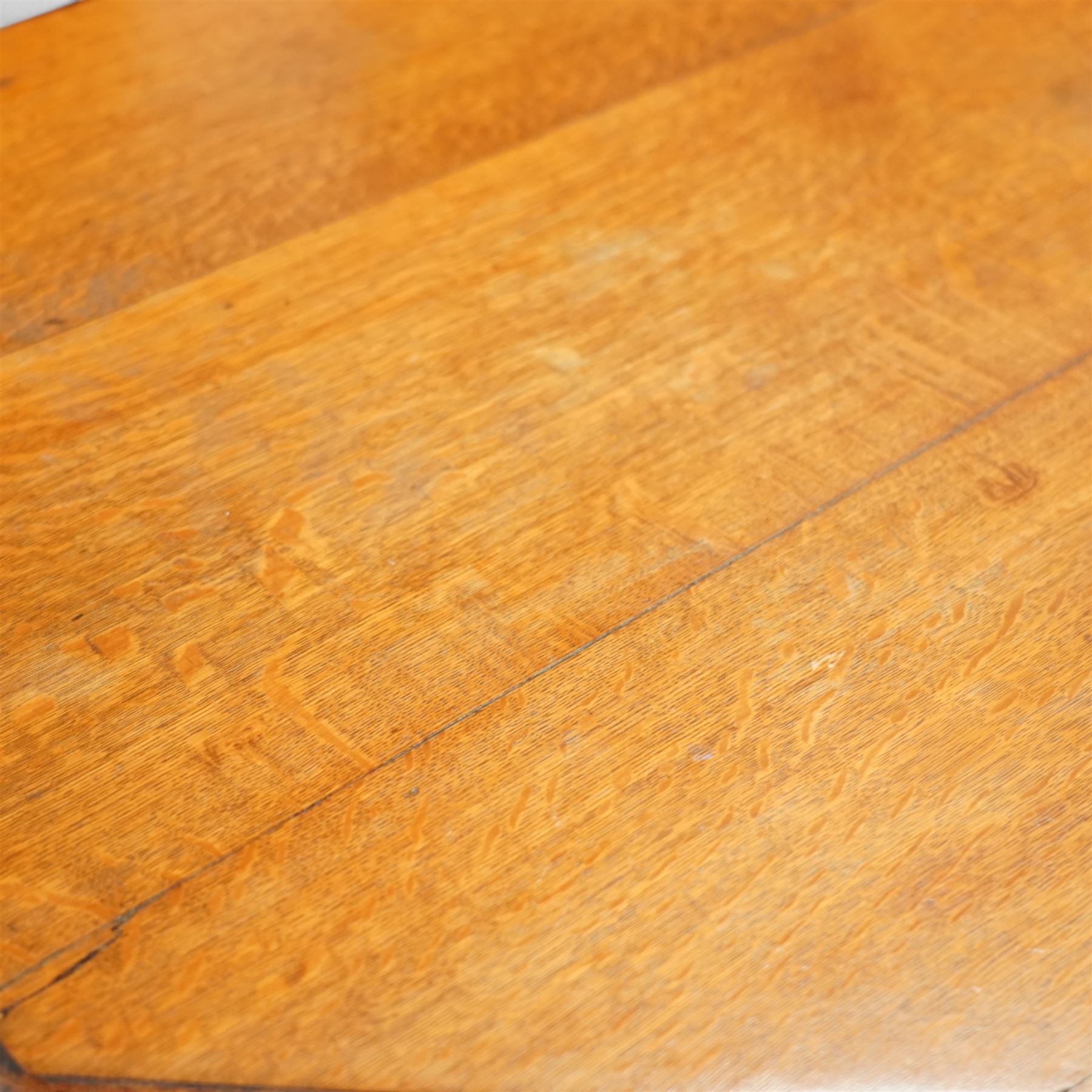 Late Victorian oak centre table, octagonal moulded top over a carved Gothic arched frieze, raised on quadruple baluster turned supports united by X-stretcher with ebonised detailing