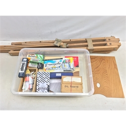  Three Artist's palette boards, various oil, pastel and acrylic paints and a folding easel  