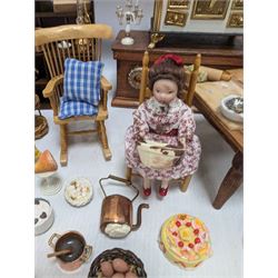 Victorian and later style dolls house kitchen furniture, including countertop, dresser displaying copper pots and blue and white ceramics, baking table, oven, three figures and a collection of food and baking accessories